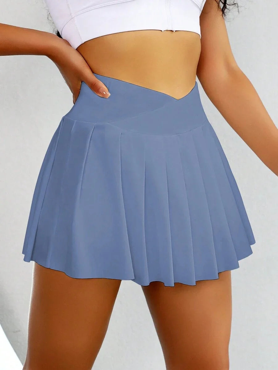 Beatriz-Falda deportiva de cintura alta con bolsillos y pantalón corto interior